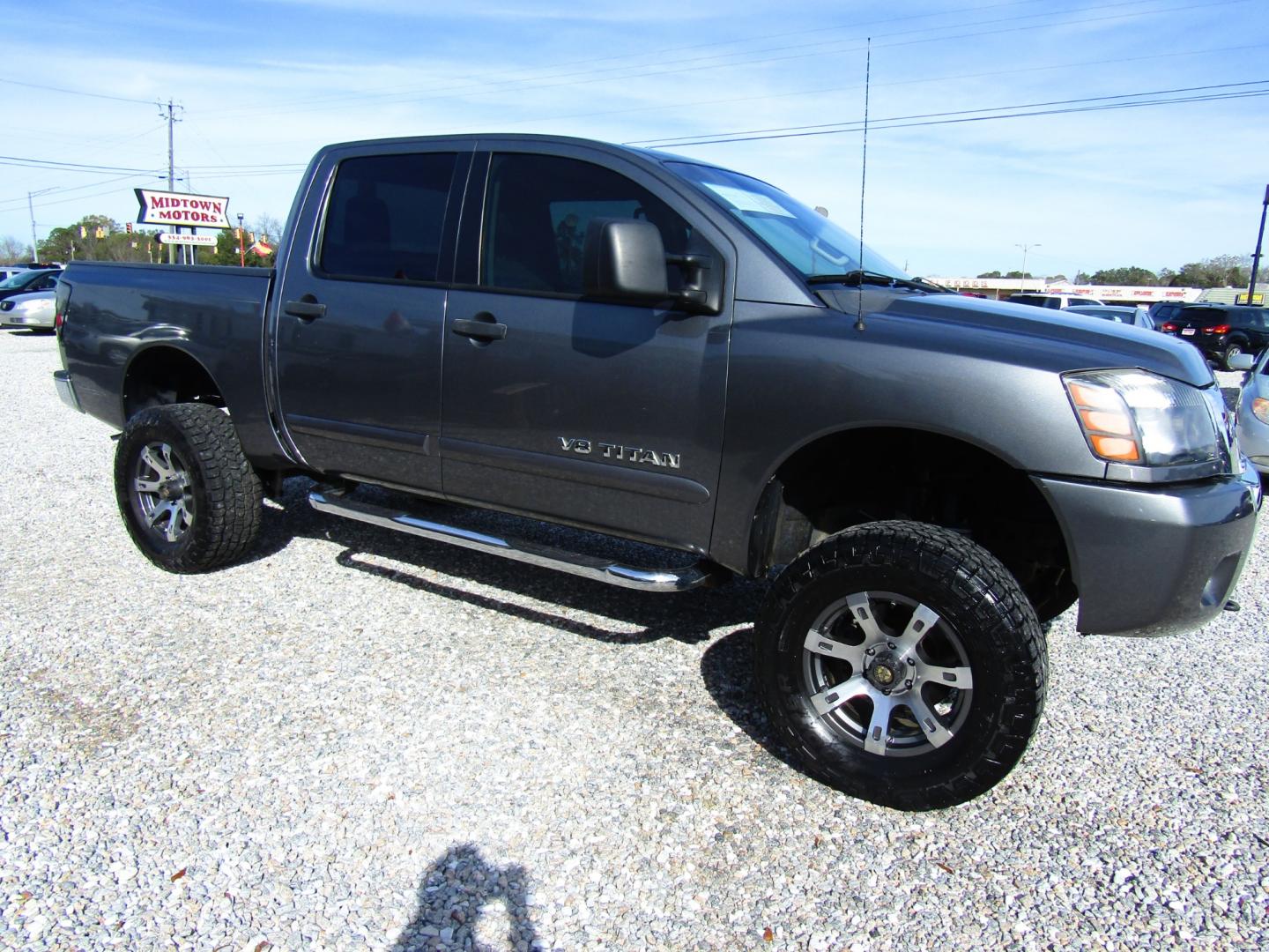 2013 Gray /Gray Nissan Titan SV Crew Cab 4WD (1N6AA0EJ3DN) with an 5.6L V8 DOHC 32V engine, Automatic transmission, located at 15016 S Hwy 231, Midland City, AL, 36350, (334) 983-3001, 31.306210, -85.495277 - Photo#0